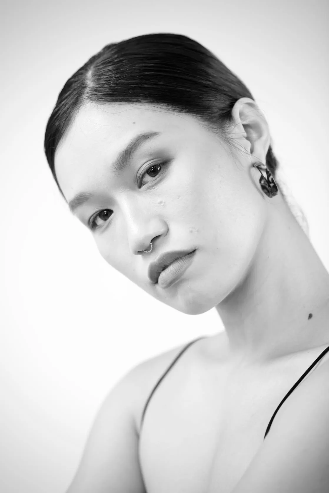 Black and white portrait of Mai Le